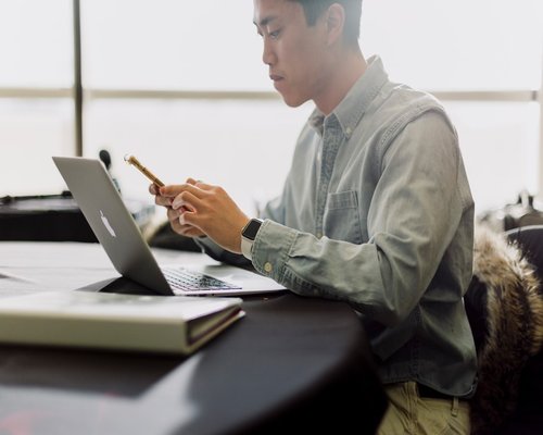 man working at desk in modern office